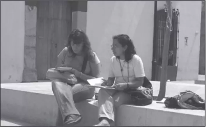 PBI volunteer speaks with WHRD Sara Mendez in Oaxaca City